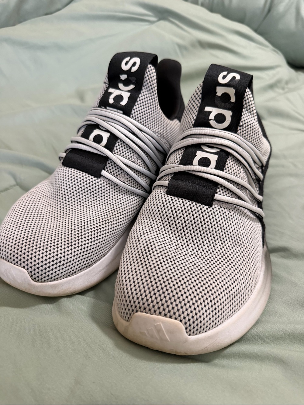 adidas men’s White and Black Knit slip-on Sneakers